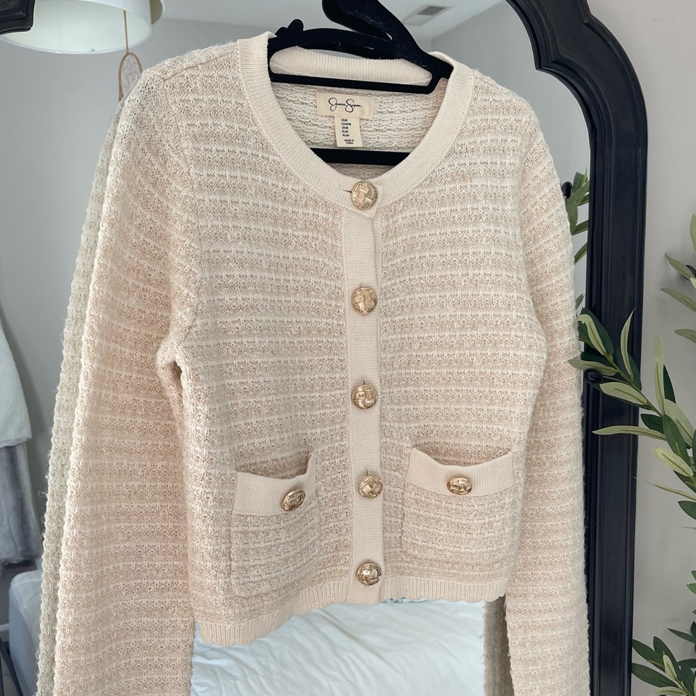 Textured knitted cream cardigan with gold details